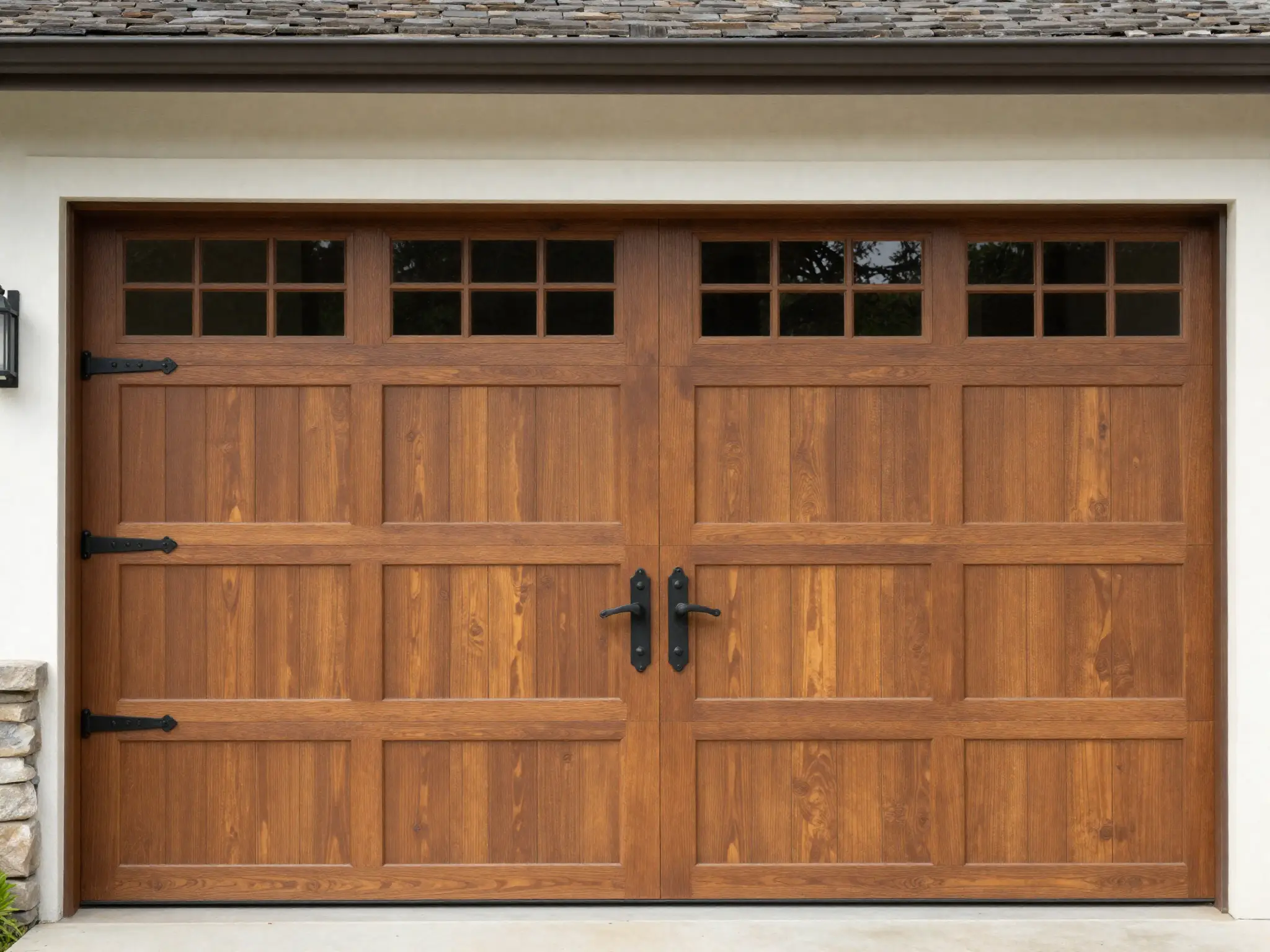 Carriage house style garage door with decorative hardware